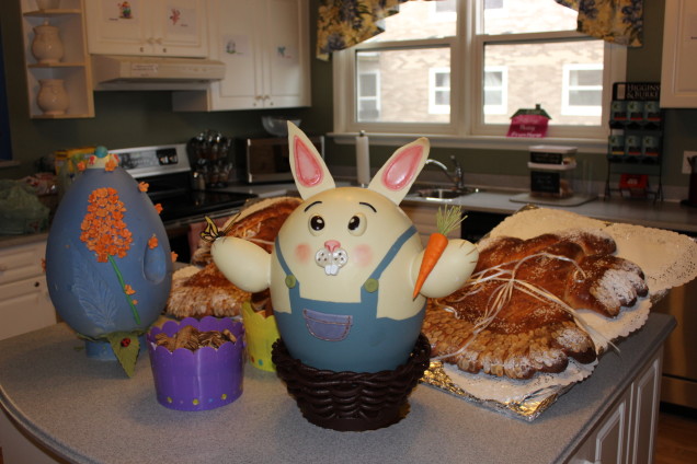 Easter bunny and tasty treats on a counter top.